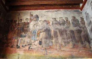 Hernán Cortés saluda y se arrodilla ante los "12 apóstoles" franciscanos, a la llegada de estos a las cercanías de la actual Ciudad de México, según una pintura hecha en la Iglesia de la Inmaculada Concepción en Ozumba, Estado de México. Crédito: AlejandroLinaresGarcia / Wikimedia Commons (CC BY-SA 4.0).